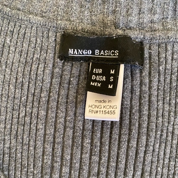 I'm selling a long sleeve dark gray size M sweater. - Picture 2 of 4